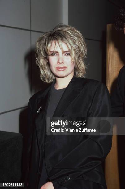 British singer Kim Wilde, dressed in black, backstage at Private Eyes, a nightclub where the singer performed her first live show in New York City,...