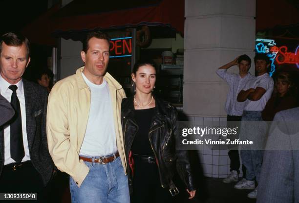 American actor Bruce Willis and his wife, American actress Demi Moore attend the premiere of 'Chances Are' held at the Mann Bruin Theatre in Los...