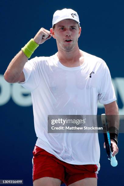 James Duckworth of Australia celebrates match point against David Goffin of Belgium during the Miami Open at Hard Rock Stadium on March 26, 2021 in...