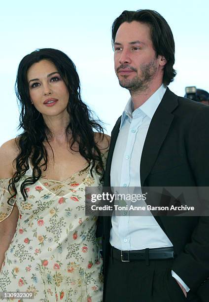 Monica Bellucci and Keanu Reeves during 2003 Cannes Film Festival - "Matrix Reloaded" Photo Call at Palais des Festivals in Cannes, France.