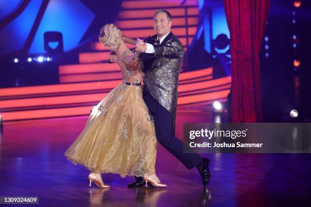 Kai Ebel and Kathrin Menzinger perform on stage during the 5th show of the 14th season of the television competition "Let's Dance" on March 26, 2021...