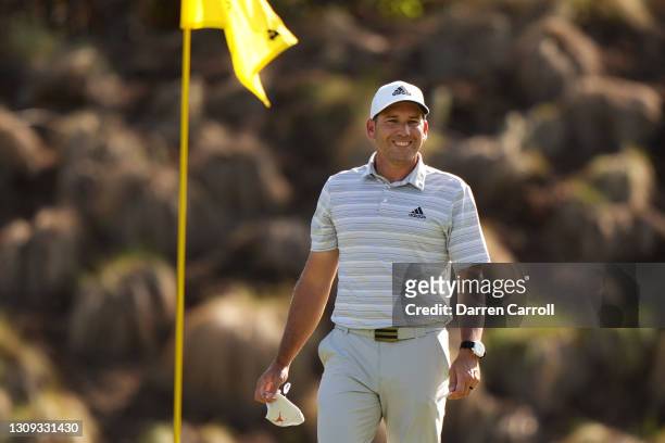 Sergio Garcia of Spain celebrates after hitting a hole in one on the fourth playoff hole in his playoff match against Lee Westwood of England during...