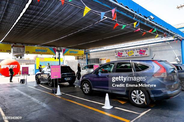 Cars drive through the car wash during TBS' Wipeout Premiere Event on March 26, 2021 in Los Angeles, California. 902500