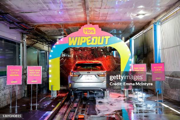 Cars drive through the car wash during TBS' Wipeout Premiere Event on March 26, 2021 in Los Angeles, California. 902500