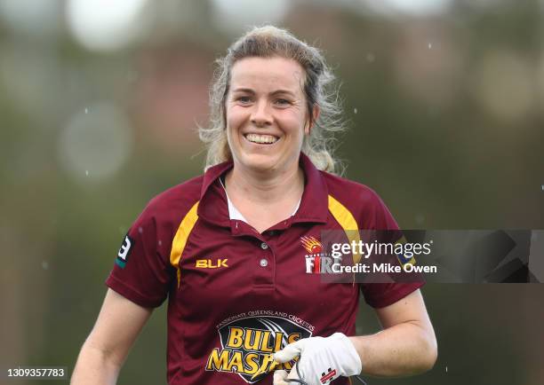 Georgia Redmayne of Queensland leaves the field of play after the first innings during the WNCL Final match between Victoria and Queensland Fire at...