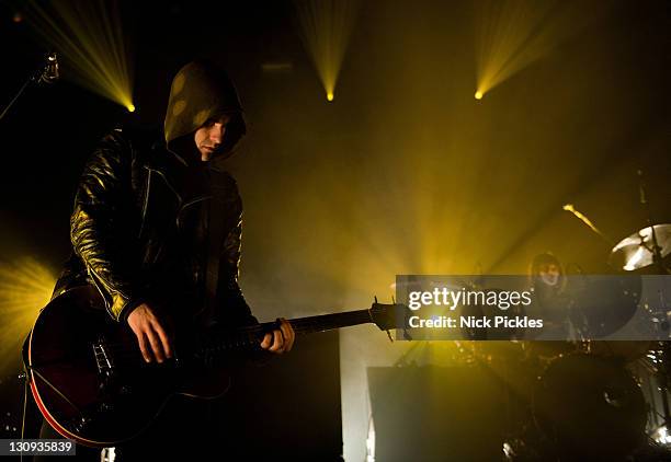 Robert Levon Been and Leah Shapiro of Black Rebel Motorcycle Club perform at Brixton Academy on December 11, 2010 in London, England.