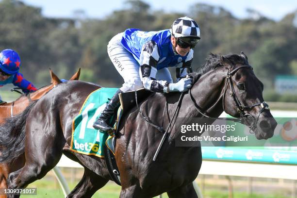 Jamie Kah riding Ironclad winning Race 8, the Bet365 Golden Mile, during the Golden Mile Raceday at Bendigo Racecourse on March 27, 2021 in Bendigo,...