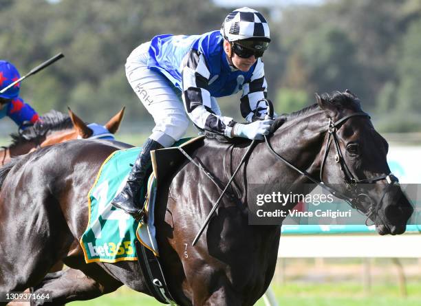 Jamie Kah riding Ironclad winning Race 8, the Bet365 Golden Mile, during the Golden Mile Raceday at Bendigo Racecourse on March 27, 2021 in Bendigo,...