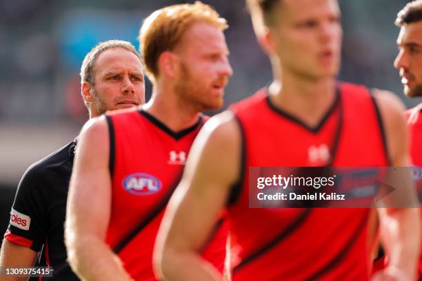 Ben Rutten, Senior coach of the Bombers walks from the ground at half time during the round 2 AFL match between Port Adelaide and the Essendon...