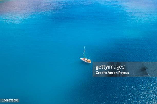 yacht in turquoise water. luxury vacation at sea, yachting - blue sailboat stock pictures, royalty-free photos & images