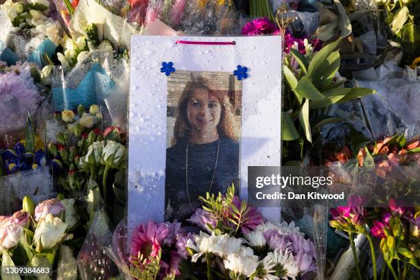 Flowers surround the Clapham Common bandstand memorial to murdered Sarah Everard on March 27, 2021 in London, England. Sarah Everard, a 33-year-old...