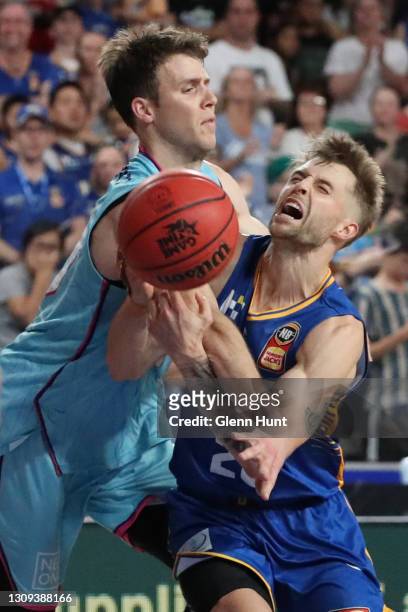 Tom Abercrombie of the Breakers and Nathan Sobey of the Bullets collide during the round 11 NBL match between the Brisbane Bullets and the New...