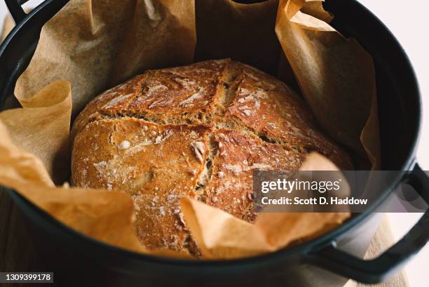 fresh-baked bread - dutch oven stock pictures, royalty-free photos & images