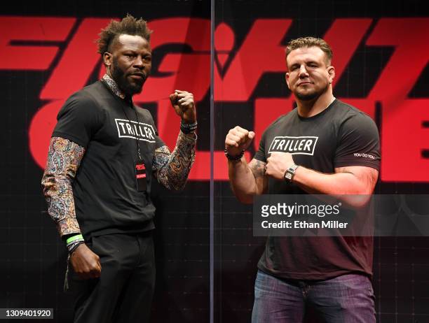 Steve Cunningham and Frank Mir face off in a plexiglass box during a news conference for Triller Fight Club's inaugural 2021 boxing event at The...