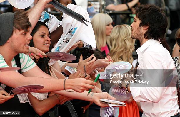 Ian Somerhalder signs autographs on the red carpet at the 22nd Annual MuchMusic Video Awards at MuchMusic HQ on June 19, 2011 in Toronto, Canada.