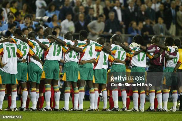 The Senegalese team line up for the national anthem before the World Cup 1st round match between France and Senegal at the Seoul World Cup Football...