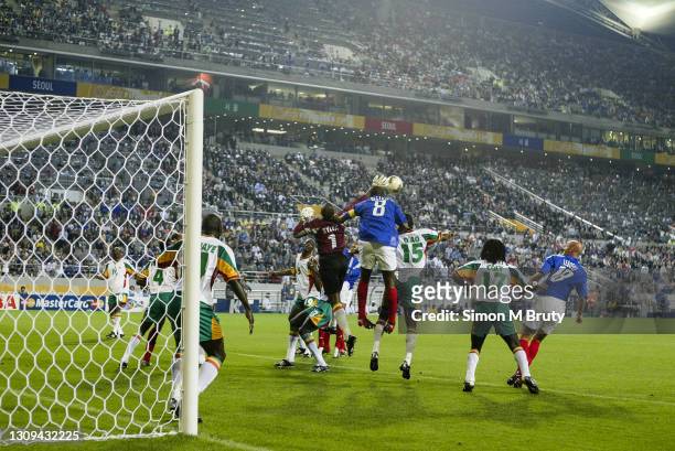 Tony Sylva goalkeeper for Senegal and Marcel Desailly of France in action during the World Cup 1st round match between France and Senegal at the...