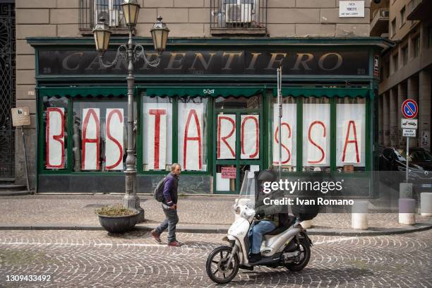 The windows of a shop with the inscription "Basta Rossa" for the protest of a trader against the Red Zone and the restrictions for the covid-19...