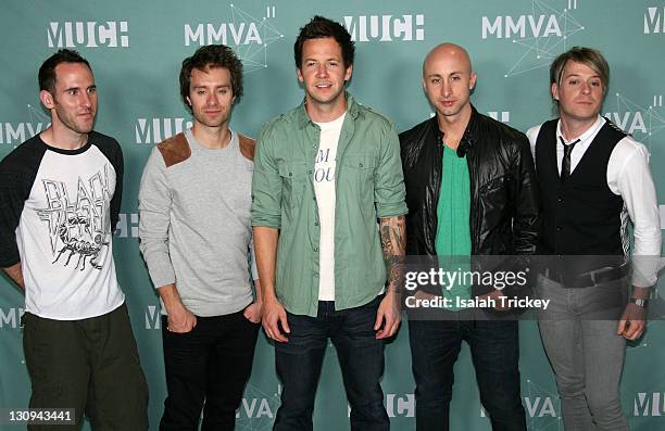 Simple Plan pose in the press room at the 22nd Annual MuchMusic Video Awards at MuchMusic HQ on June 19, 2011 in Toronto, Canada.