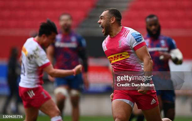 Joe Marchant of Harlequins celebrates after scoring his side's third try during the Gallagher Premiership Rugby match between Bristol and Harlequins...