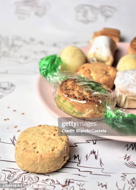 typical almond sweets in spain - polvorón stock pictures, royalty-free photos & images
