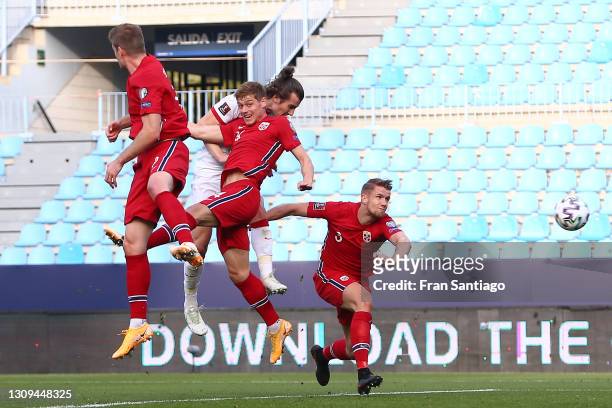 Caglar Soyuncu of Turkey scores their team's second goal during the FIFA World Cup 2022 Qatar qualifying match between Norway and Turkey at the La...
