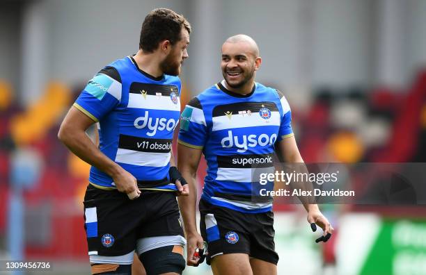 Jonathan Joseph of Bath shares a joke with Zach Mercer during the Gallagher Premiership Rugby match between London Irish and Bath at Brentford...