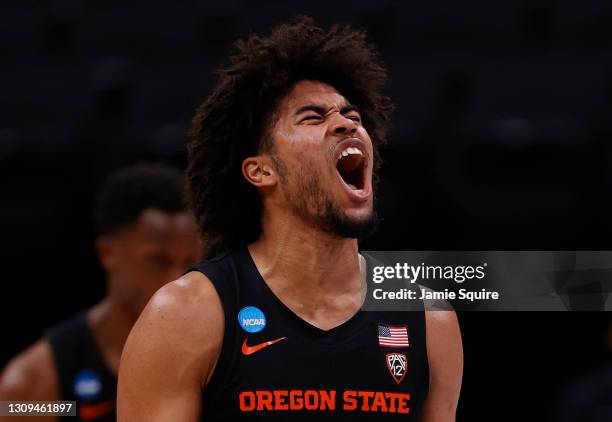 Ethan Thompson of the Oregon State Beavers celebrates against the Loyola-Chicago Ramblers during the first half in the Sweet Sixteen round of the...