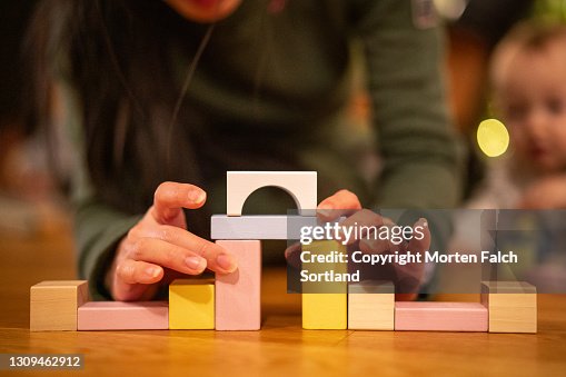 Factors Using Building Blocks Building A Structure Using Building Blocks Toy High-Res Stock Photo ...
