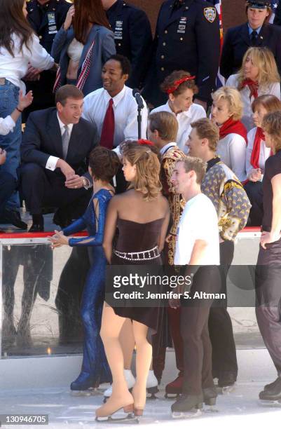 Prince Andrew, left, talks with ice skaters after their performances during the 65th Opening of the Rink at Rockefeller Center.