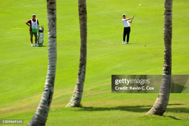 Emiliano Grillo of Argentina plays a shot on the 15th hole during the third round of the Corales Puntacana Resort & Club Championship on March 27,...