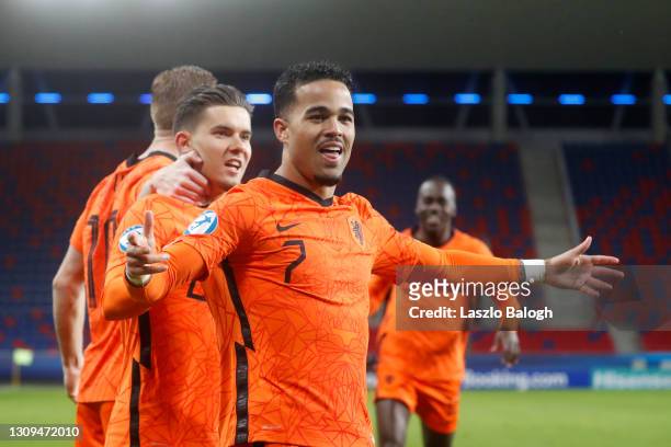 Justin Kluivert of Netherlands celebrates with teammates after scoring their team's first goal during the 2021 UEFA European Under-21 Championship...