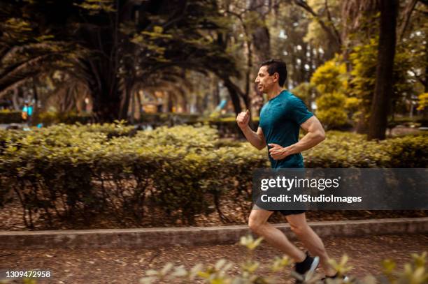 Running Single Man 16,648 One Man Running Park Stock Photos, High-Res Pictures, and Images ...