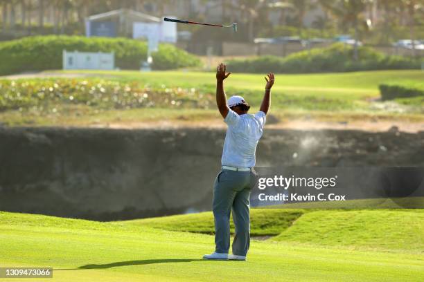 Rafael Campos of Puerto Rico reacts to a long birdie putt on the 18th green during the third round of the Corales Puntacana Resort & Club...