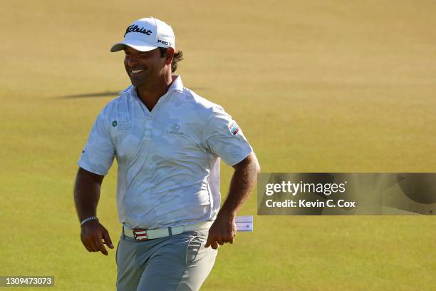 Rafael Campos of Puerto Rico reacts to a long birdie putt on the 18th green during the third round of the Corales Puntacana Resort & Club...