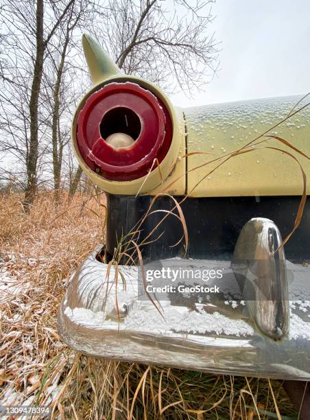 close-up of tail light and chrome bumper, vintage car - stock photo car chrome bumper stock-fotos und bilder