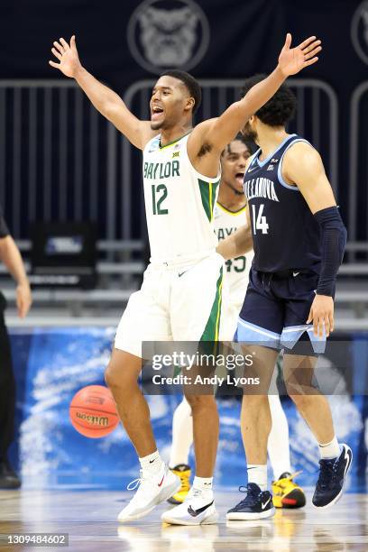 Jared Butler of the Baylor Bears celebrates after a play against the Villanova Wildcats in the second half of their Sweet Sixteen game of the 2021...