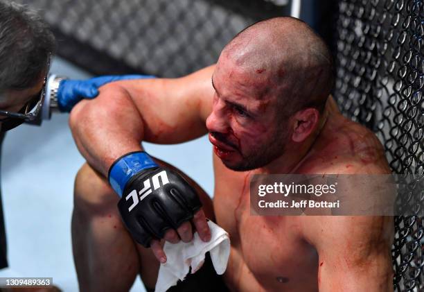 Abu Azaitar of Morocco reacts after his TKO loss to Marc-Andre Barriault of Canada in their middleweight fight during the UFC 260 event at UFC APEX...