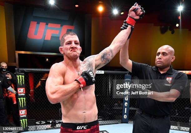 Marc-Andre Barriault of Canada reacts after his victory over Abu Azaitar of Morocco in their middleweight fight during the UFC 260 event at UFC APEX...