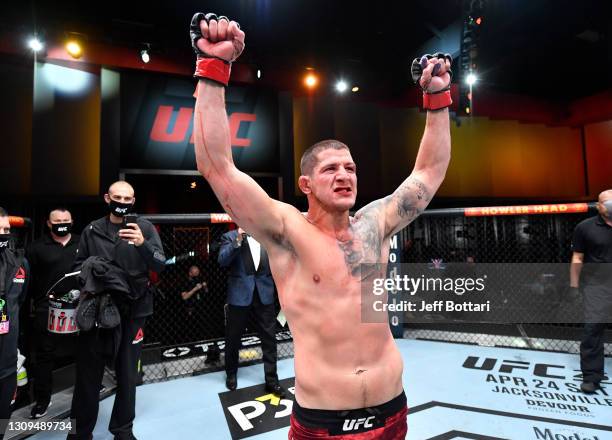 Marc-Andre Barriault of Canada reacts after his victory over Abu Azaitar of Morocco in their middleweight fight during the UFC 260 event at UFC APEX...