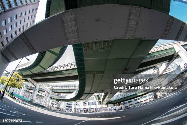 urban highway junction in osaka city of japan - fish eye photos et images de collection