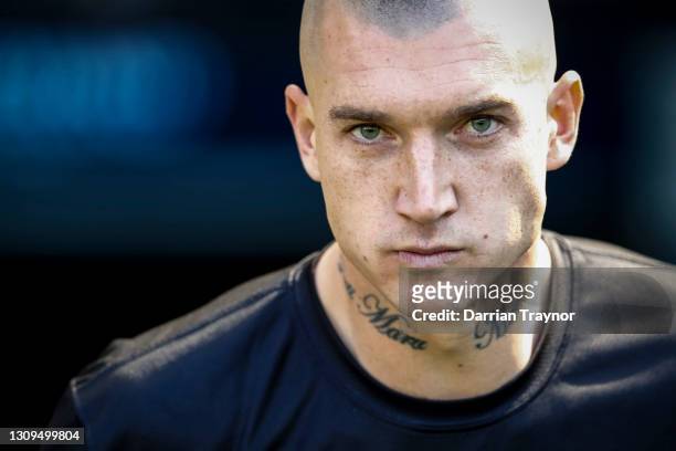 Dustin Martin of the Tigers walks out to warm up before the round 2 AFL match between the Hawthorn Hawks and the Richmond Tigers at Melbourne Cricket...