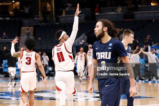 Jalen Tate of the Arkansas Razorbacks celebrates after defeating the Oral Roberts Golden Eagles in the Sweet Sixteen round of the 2021 NCAA Men's...