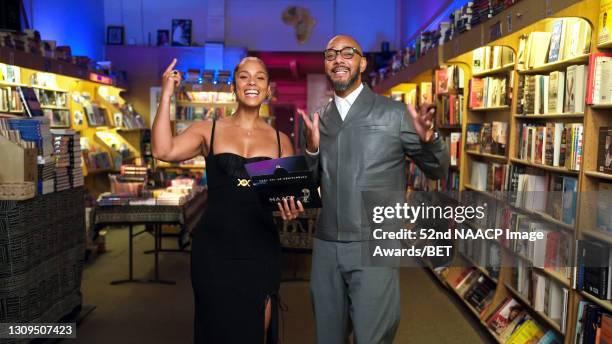 In this screengrab, presenters Alicia Keys and Swizz Beatz speak during the 52nd NAACP Image Awards on March 27, 2021.