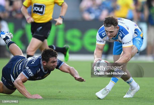 Brimson of the Titans scores a try during the round three NRL match between the North Queensland Cowboys and the Gold Coast Titans at QCB Stadium on...