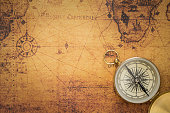 Old compass on vintage map