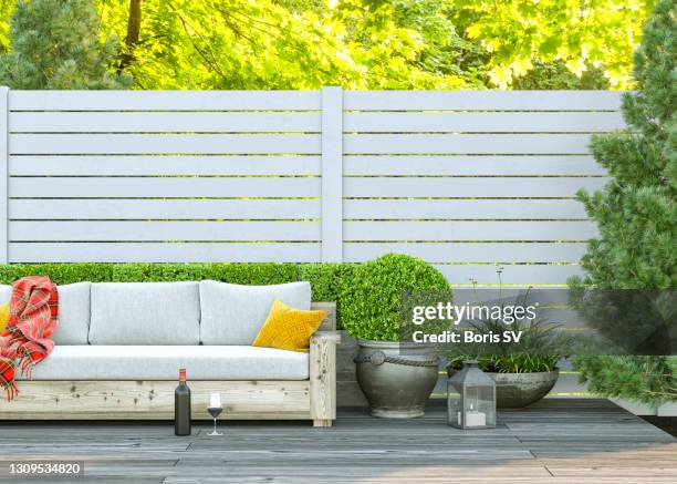 red wine on the patio - wooden bench stock pictures, royalty-free photos & images