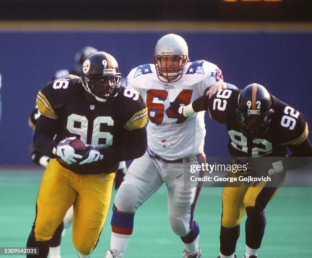 Defensive lineman Brentson Buckner of the Pittsburgh Steelers runs 46 yards with the football for a touchdown after recovering a fumble by...