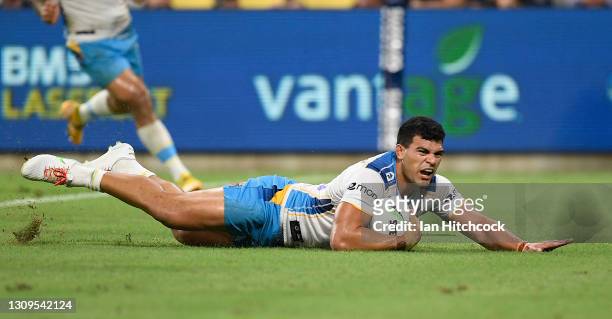 David Fifita of the Titans scores a try during the round three NRL match between the North Queensland Cowboys and the Gold Coast Titans at QCB...