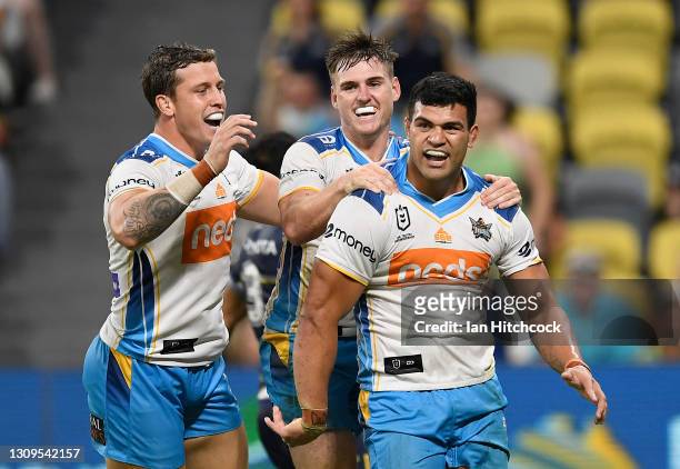 David Fifita of the Titans celebrates after scoring a try during the round three NRL match between the North Queensland Cowboys and the Gold Coast...